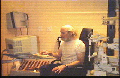 [patient carrying out colour vision test,
69Kbyte]